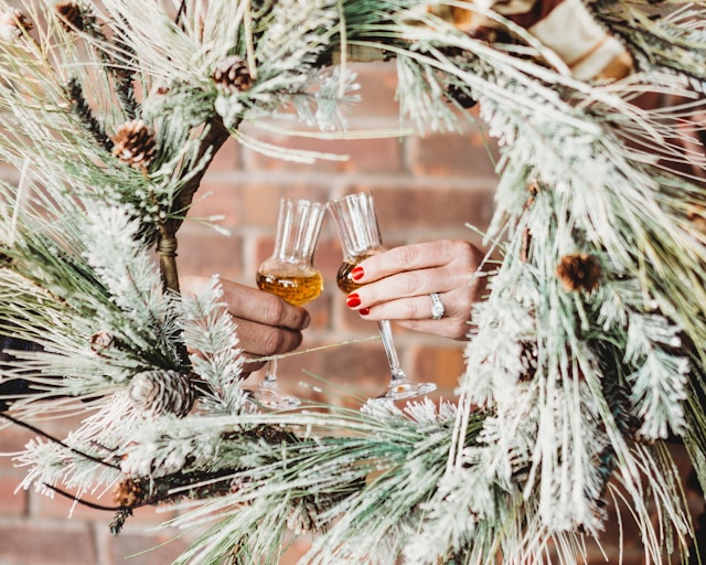 Elegant holiday party bar setup in Colorado featuring seasonal cocktails and warm lighting