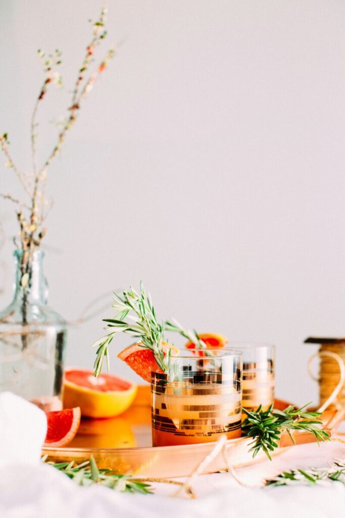 Elegant holiday party bar setup in Colorado featuring seasonal cocktails and warm lighting